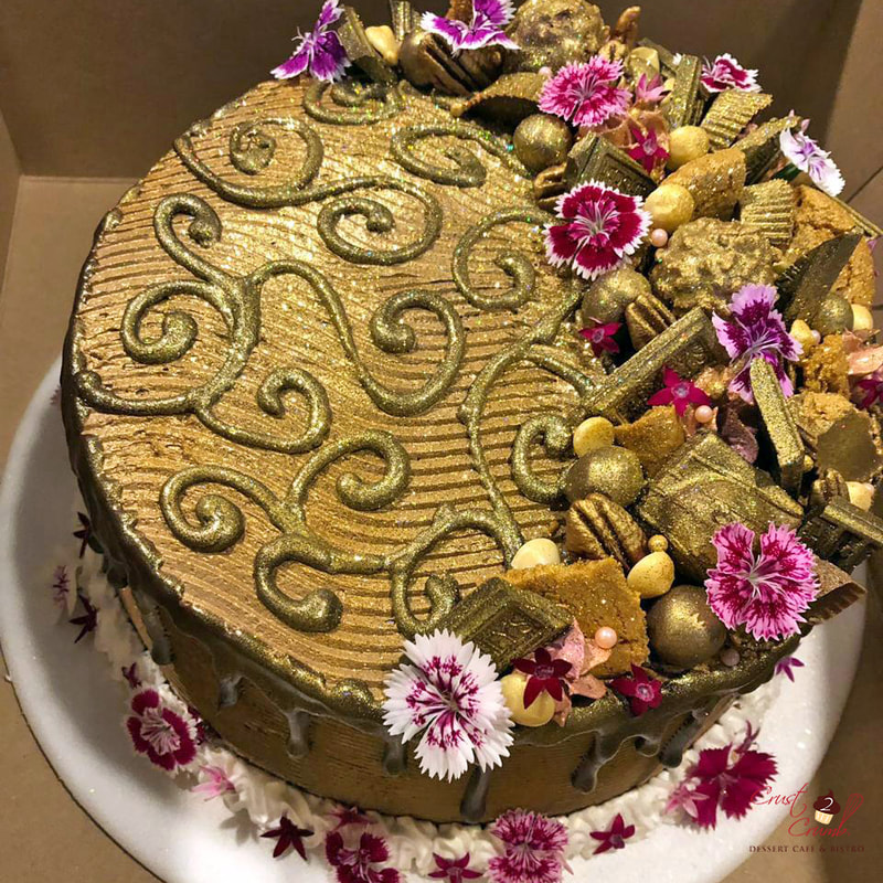 Gold Chocolate Cake with Fusia Flowers